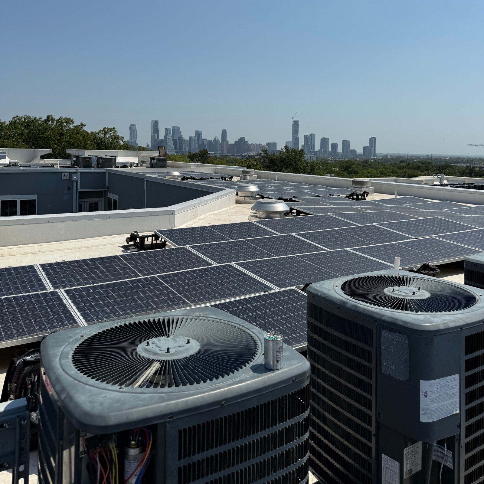 Air Dynamics of Tulsa HVAC Technician performing repair work.